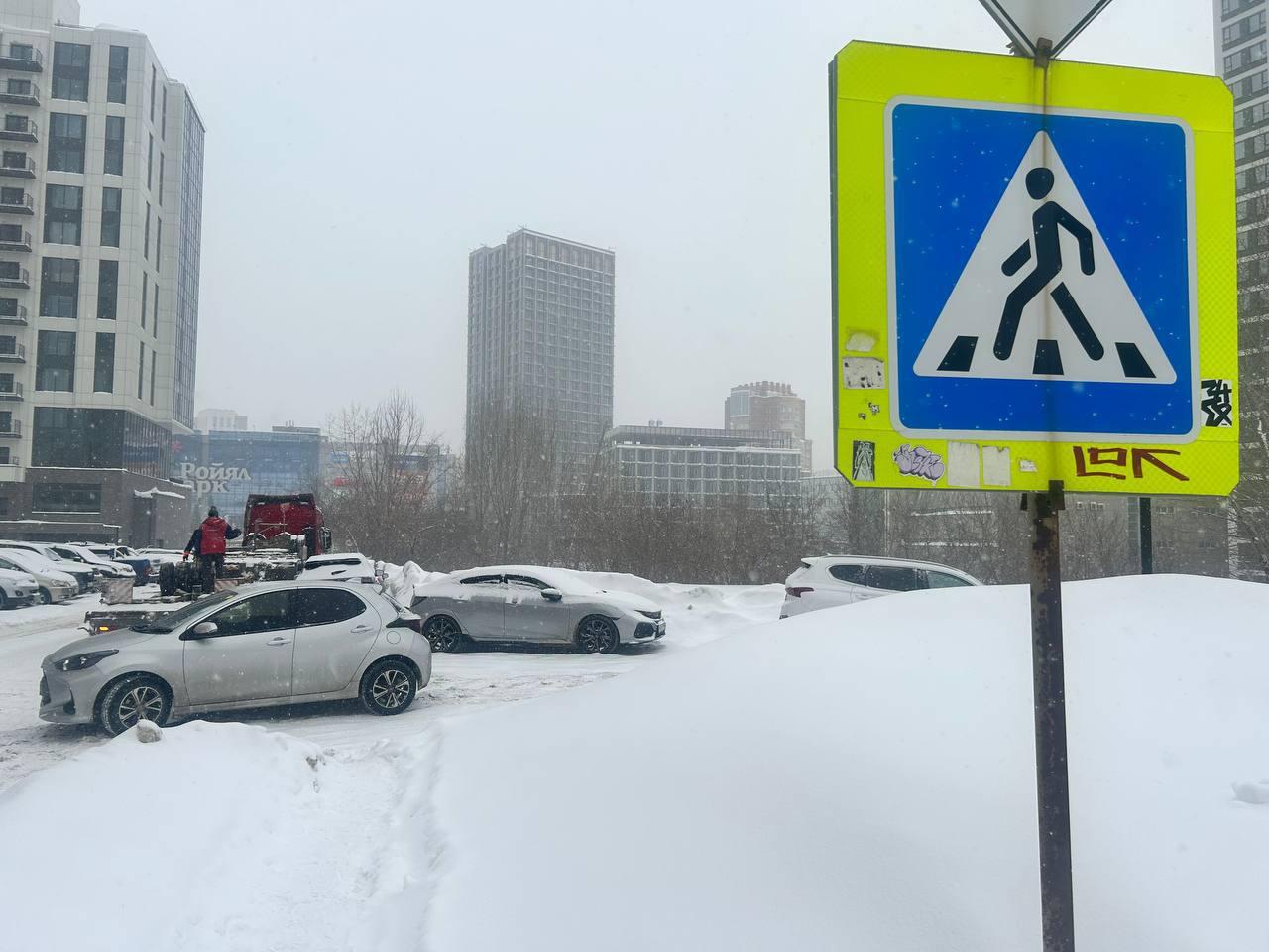 Фото Новосибирск засыпало снегом накануне 40-градусных морозов: 10 кадров аномальной погоды 4